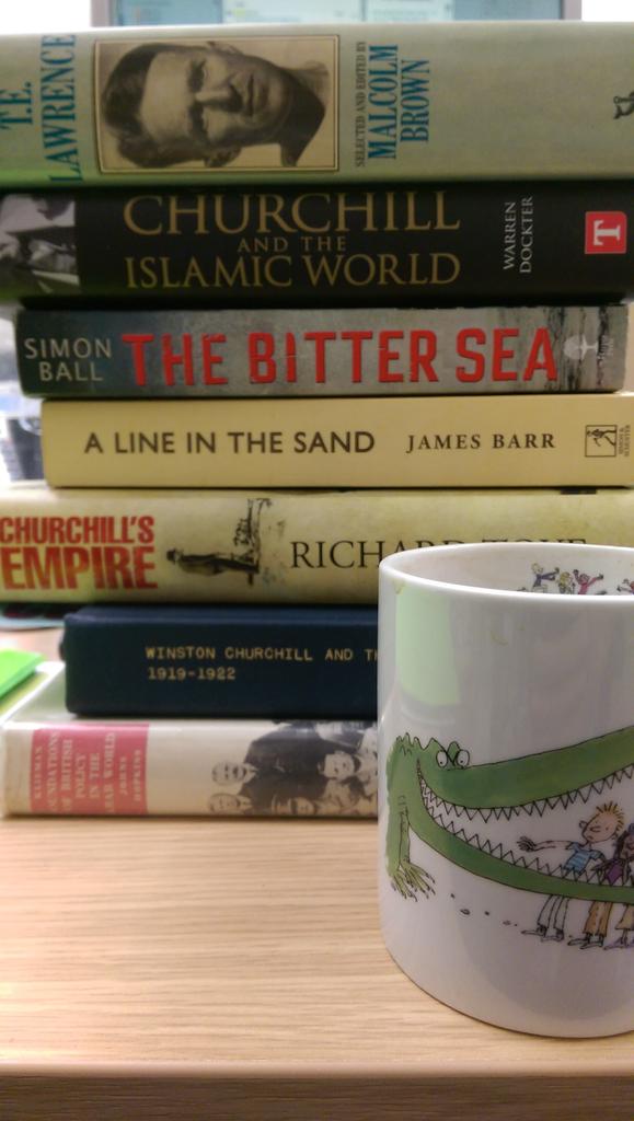 curatorian's tweet image. My mug on #RoaldDahlDay is Quentin Blake's #EnormousCrocodile. And some current reading material #WarMuseumWork