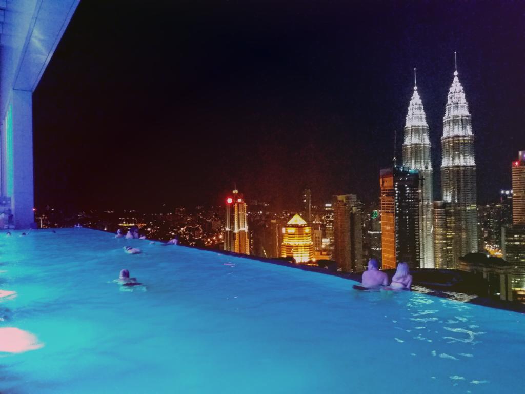 NOMADasaurus's tweet photo. Chilling out on our last night in #kualalumpur. Awesome view. Thanks to our #Airbnb host Ikhwan. #Malaysia #travel https://t.co/xvhJuzu9Ld