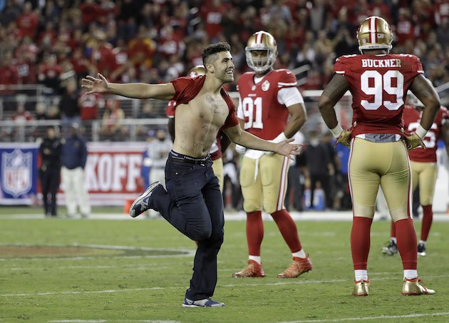 Image result for mnf man runs out onto football field