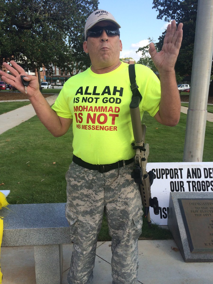 ChristianDLRTV's tweet photo. Protestor shows up with rifle and handgun. He says he'll use it if he's attacked #mosqueprotest @cbs46 https://t.co/OLjRhejAva
