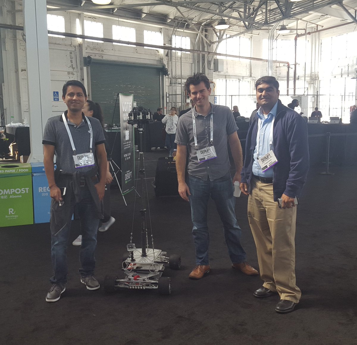 PacHackathon's tweet photo. Day 2 @TCDisrupt. Can you spot the non-Panasonic employee? #iOS #Javascript #Android https://t.co/ANffqZptQ7
