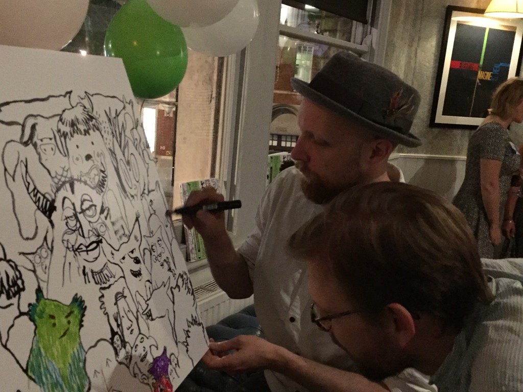MacmillanKidsUK's tweet photo. It's getting competitive at the #mcbdrawit launch - Alexis Deacon and Joel Stewart go head to head! https://t.co/3nkTdw9kkG