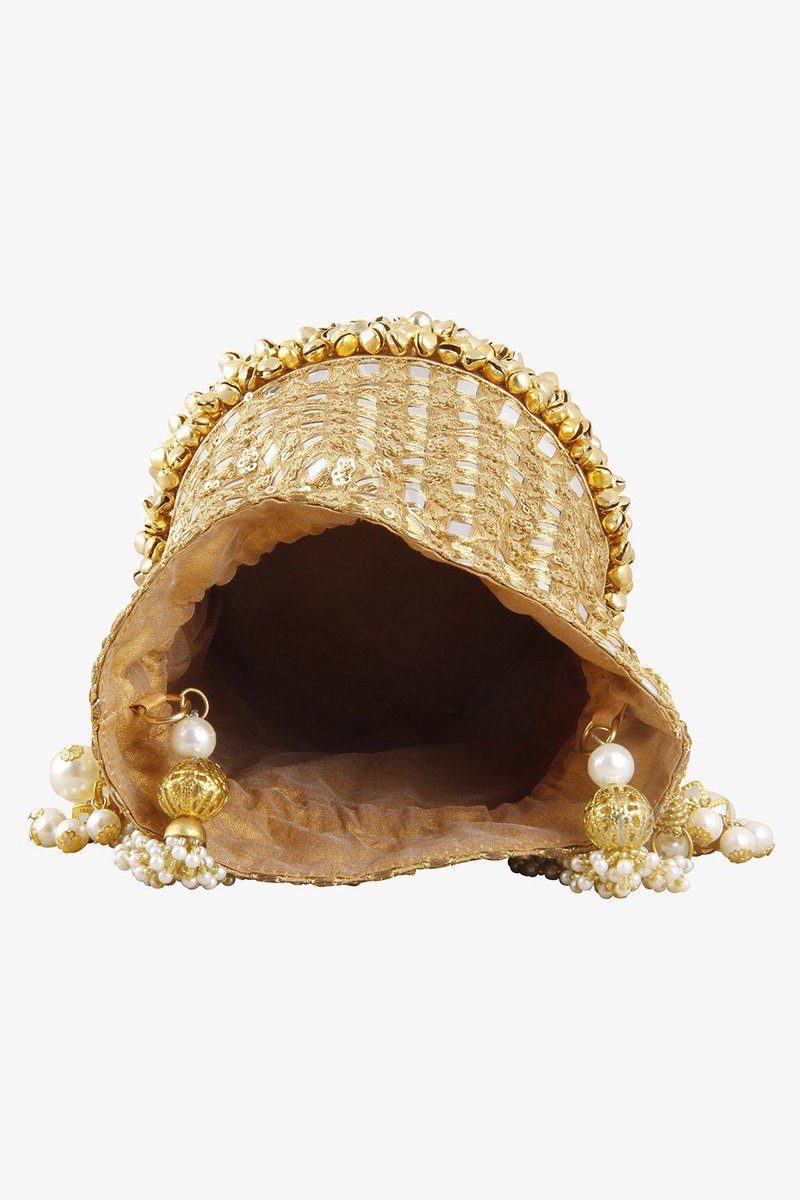 MangoCloset's tweet photo. For the #festive season, shop for this glittery mirrorwork #potli only at @MangoCloset #Fashion #accessories https://t.co/EWTxwyIexw