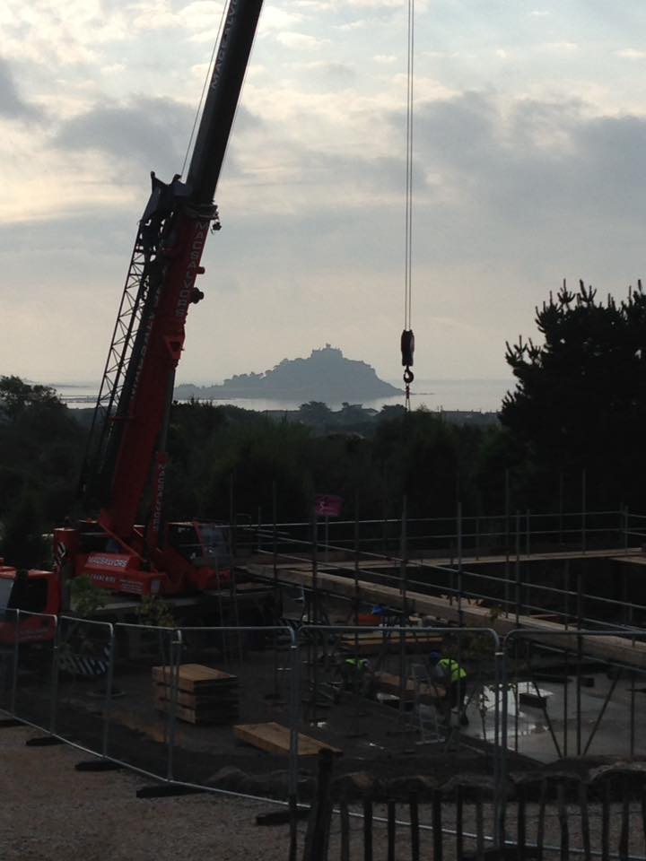 Raising the oak frame today <a href="/Tremenheere/">Tremenheere</a> sculpture garden. What a view! #oakframe #Cornwall #goodmorning