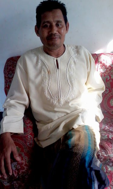 hujan kali ini tak memulangkanmu ayah.......