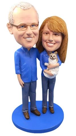 BobbleheadBoss's tweet photo. This couple is cozy with their kitty cat...#DoYouBobble? https://t.co/EX39exRhga