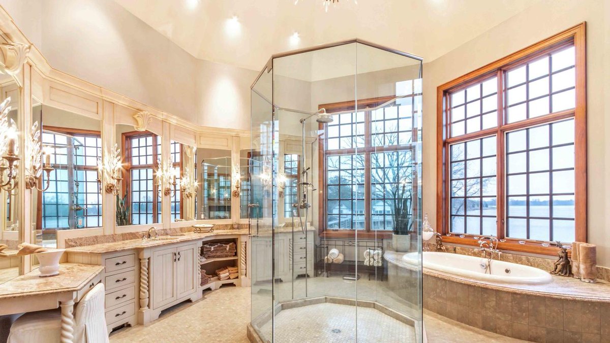 Home of the day lake geneva mansion with elevator, guest house listed