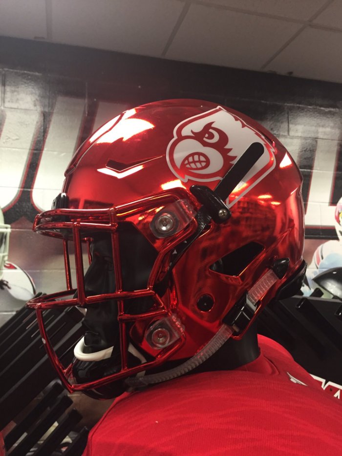 CollegeGameDay's tweet photo. These Louisville helmets for Saturday are complete 🔥 🔥 🔥 (via @UofLEquipment) https://t.co/n2xP2MGuI9