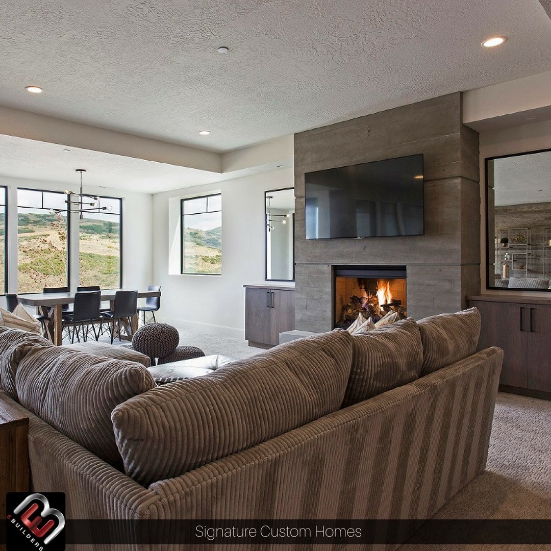 EBuildersUtah's tweet photo. With #fall coming this family room in the #MountainContemporary daylight basement looks pretty cozy #customhome https://t.co/3X4TzMNWrO