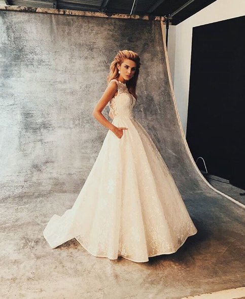 TandCollective's tweet photo. .@xChloeLloyd Looks absolutely stunning modelling this wedding dress for @Wed2b https://t.co/ashSRCKIJ5