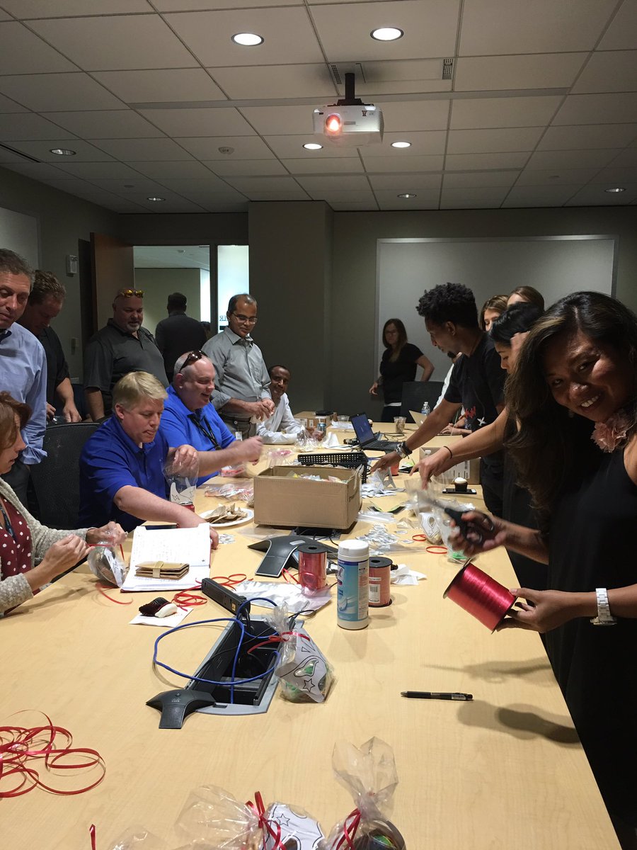 Rae1908's tweet photo. @virtustream staff filling goody bags for the kids at Children's Inn at NIH #VirtustreamGivesBack #GoBigWinBig https://t.co/7rZ4bzKUuD