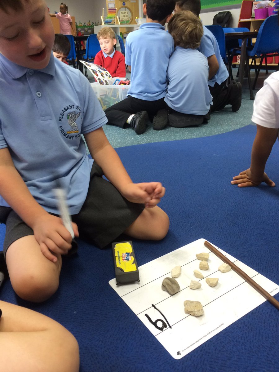MissCullender's tweet photo. Year 1 learning about teen numbers and place value @PleasantStPrim #maths using sticks and stones for 10s and 1s https://t.co/KfFdeUX5w6