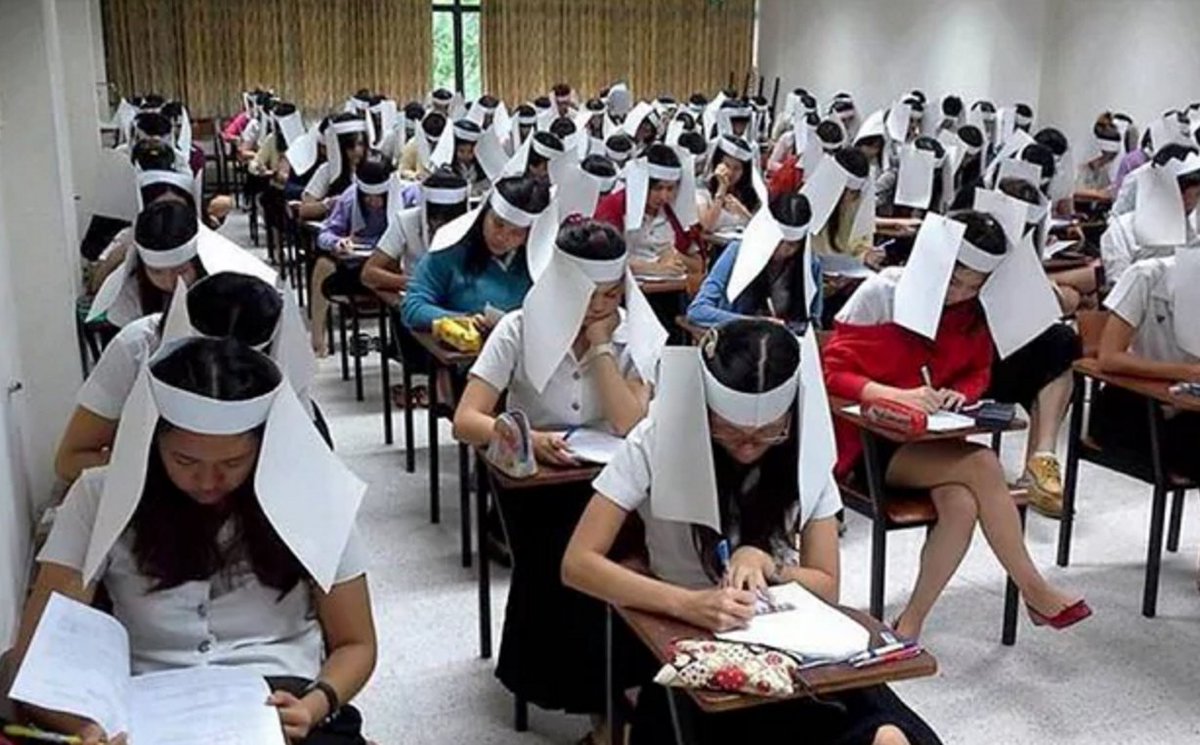UberFacts's tweet photo. University students in Thailand were once made to wear an anti-cheating helmet during tests. https://t.co/aRO3hAefow