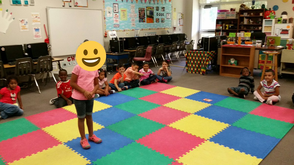Kindergarten learning about coding with an unplugged activity., find the fox!