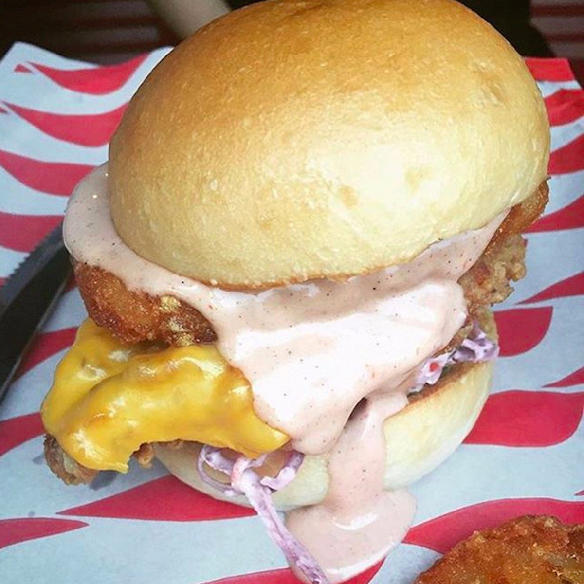 Have at our giant offering of fowl – the HDB Tower Burger, a juicy chicken fillet accompanied by all the good stuff.