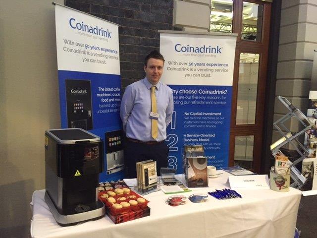 coinadrink's tweet photo. Our Tom all ready and waiting on stand 34...pop and say hi to hear all about our services...@finditinbc #fiibc https://t.co/VvzPcUXaw8