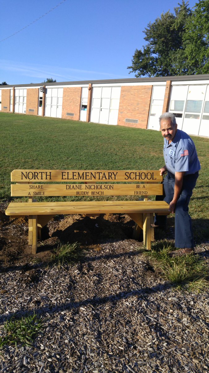 NES_MadisonOH's tweet photo. Mr. Haycox sets the Diane Nicholson Buddy Bench today on the NES playground. #wearemadisonblue https://t.co/JjcuKfdw63