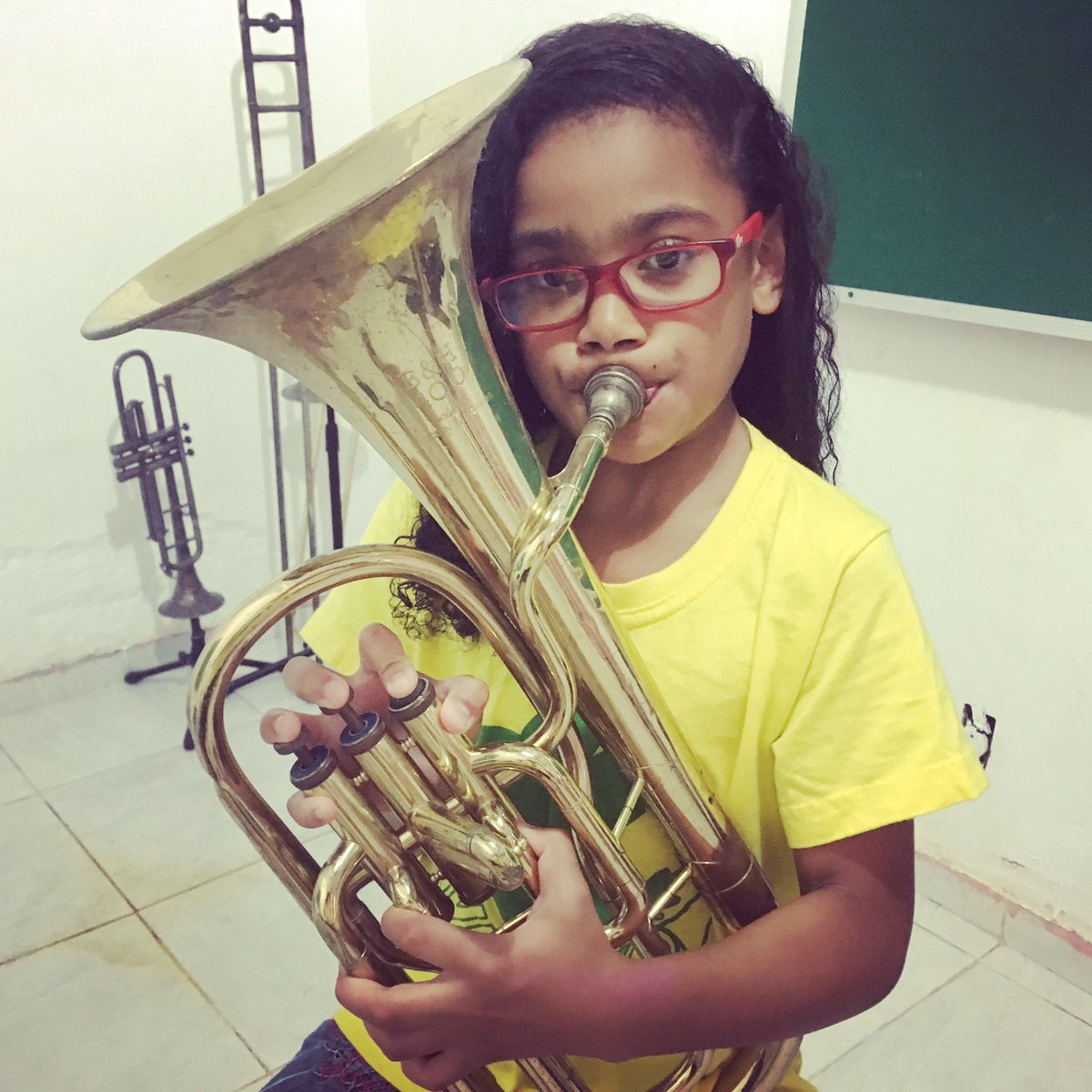 FavelaBrass's tweet photo. Maria Rita just started learning Tenor horn 💙 https://t.co/NhxuM2U707