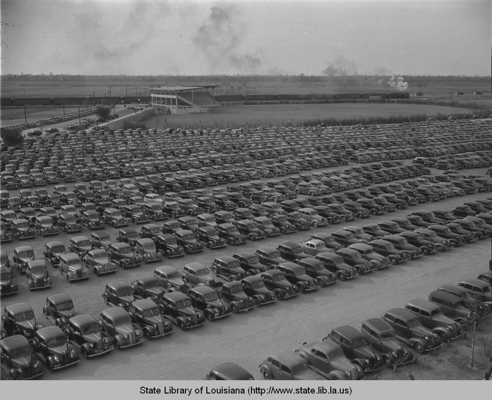 #TBT Parking area adjacent to LSU Stadium after expansion in 1938. LA 30 &amp; baseball stadium in the background