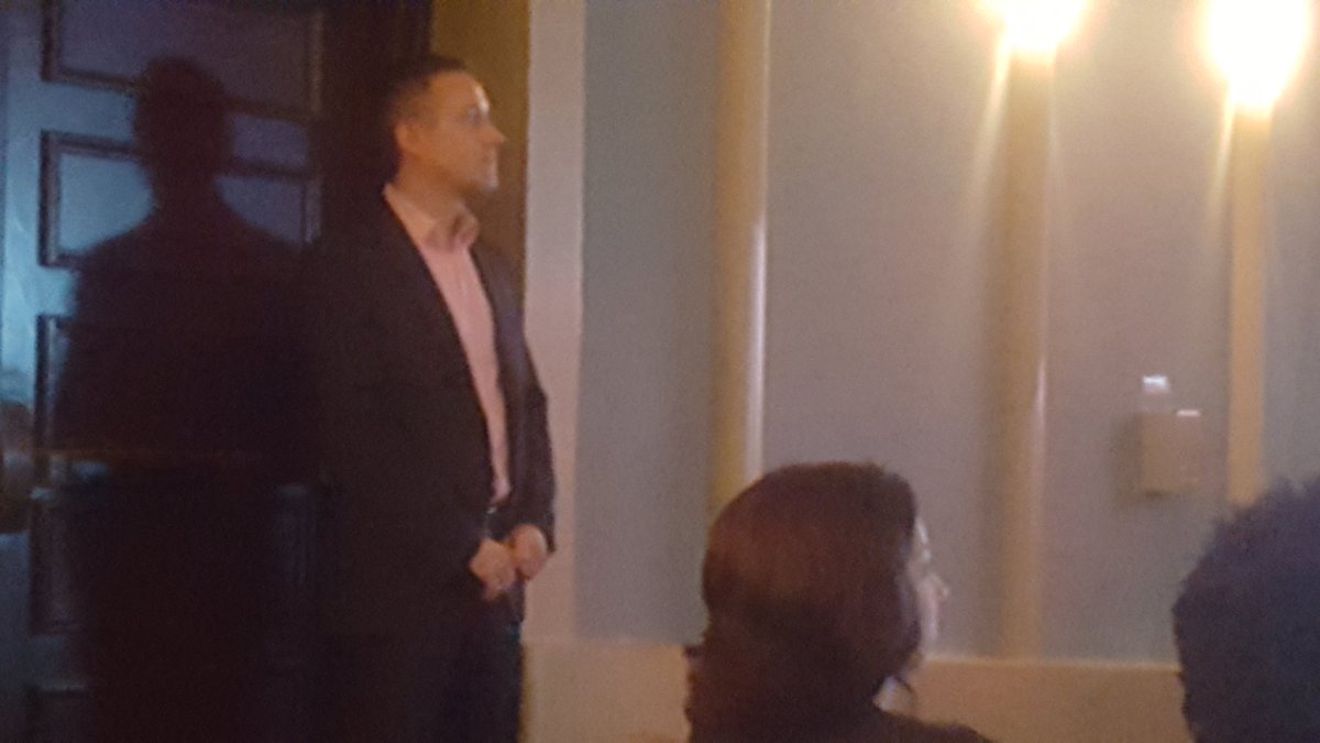 Navy Federal's Thomas Greek waiting to tka the stage at SCI worksop on Multi-generational workforce.