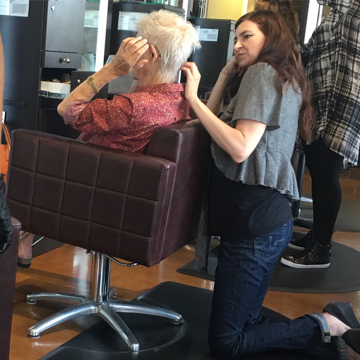 BellaSolTanning's tweet photo. This candid shot taken of our stylist Christy clearly shows the passion and love we have for our clients https://t.co/0VYR5cgMed
