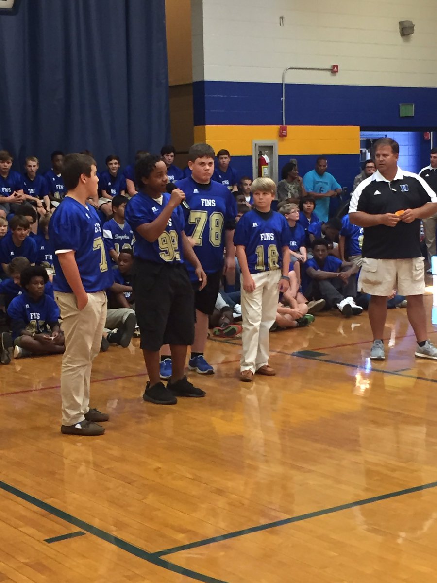 dauphin_high's tweet photo. Beat those Lions!!! What a wonderful pep talk given by the captains of the game!!!! https://t.co/94EsdBcErc