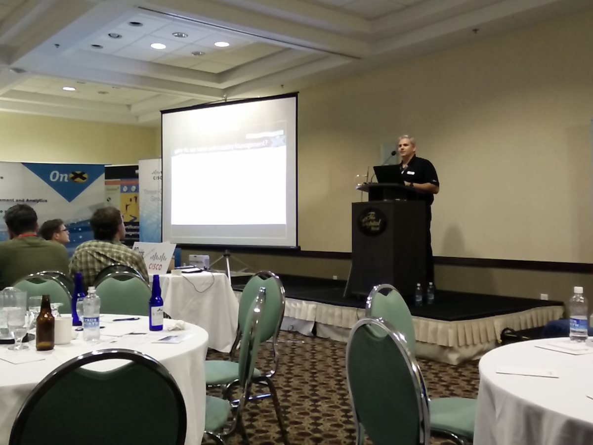 BSidesStJohns's tweet photo. Ed Dubrovsky giving a great talk on building a bulletproof vulnerability management program! #bsidesstjohns https://t.co/kj5vNyDany