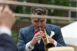 jazzagenyc's tweet photo. Our very own Michael Arenella blowing that horn like nobody’s business! #JALP2016 #jazzagelawnparty #tbt https://t.co/wUJXCsX50I