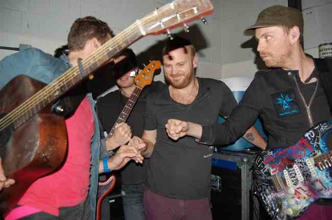 coldplay's tweet photo. #TBT Pre-gig fist bump at Norwich UEA show for @BBCR1, 27 Oct 2011. A https://t.co/LWO7tdmQzV