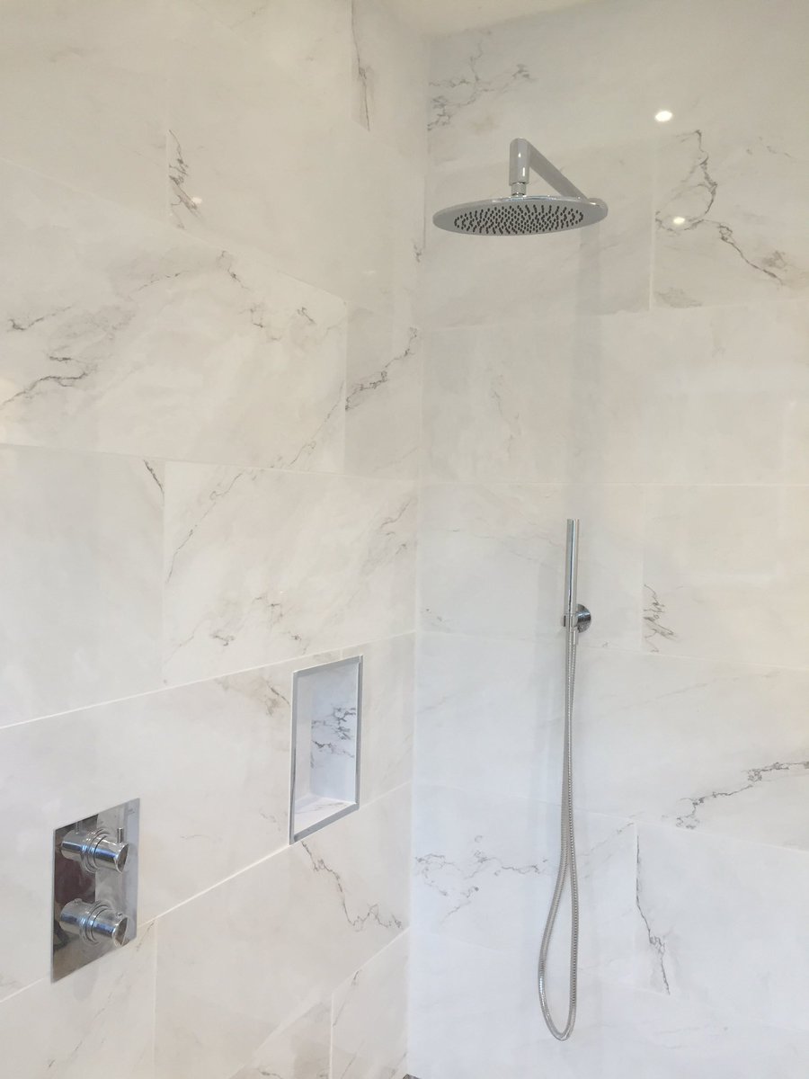 HeatingSinclair's tweet photo. Bathroom suite complete in #Surrey Ufh,tiling,plumbing great work from @dan_monkman &amp; 1 very happy customer 👌 https://t.co/C6oMjsRQq6