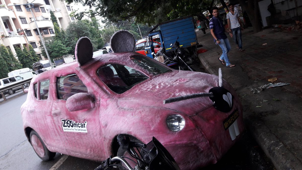 surabhis111's tweet photo. Ìnteresting branding in the Ganpati crazy city of Pune. Zoom across the city in a Mooshak. @ZoomCarIndia  #branding https://t.co/QplYnz1WXY