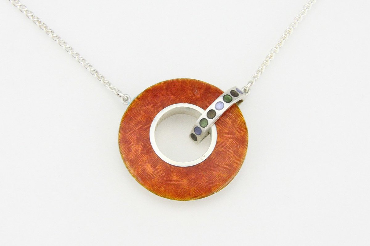 StudioFusionLDN's tweet photo. Artists working in enamel: Director of SF, Penny Davis. #pendant #fire #textured #fine #enamel #art https://t.co/oaNY4x6vHg