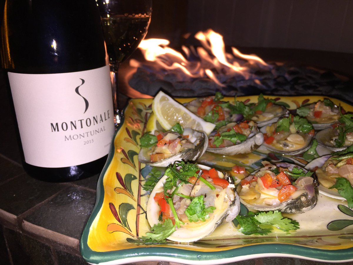 Locally harvested grilled clams casino alongside a delicious Montonale Lugana 2015. 

Thanks to Jeff T. for sharing!