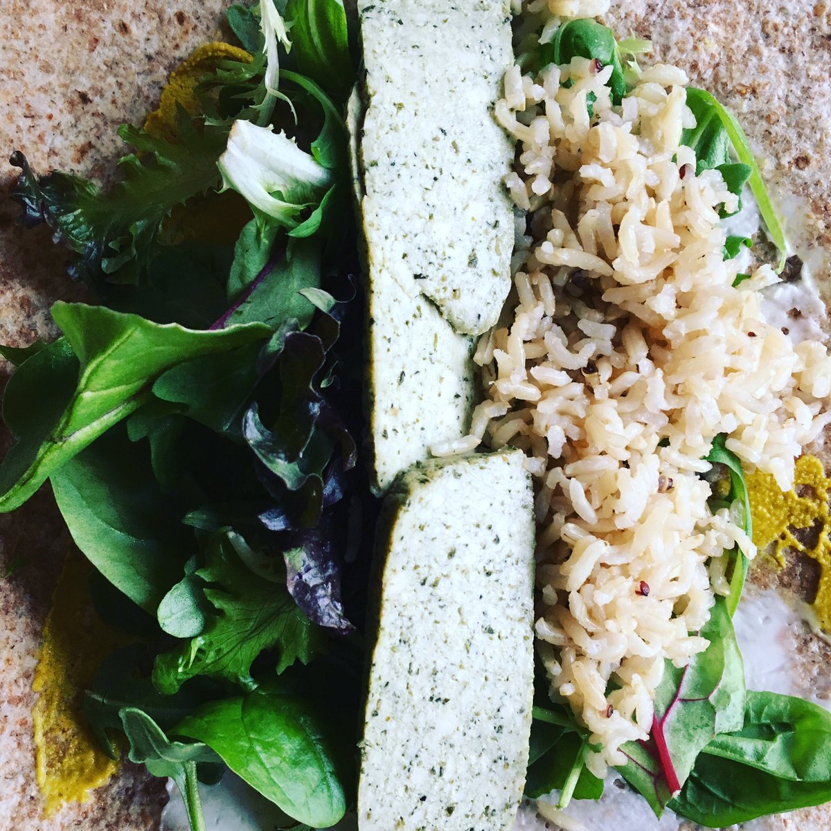 Basil tofu, rice, mixed leaves. Add a bit of vegan garlic mayo &amp; mustard... Instant vegan burrito! 🌱🍴 #veganburrito