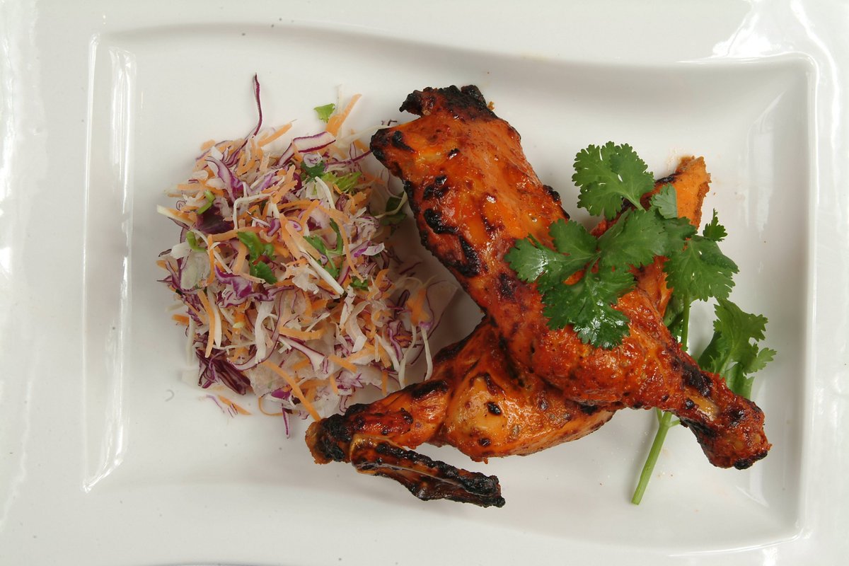 Enjoy <a href="/Madhus/">Madhu Sudhaan</a> Tandoori Chicken