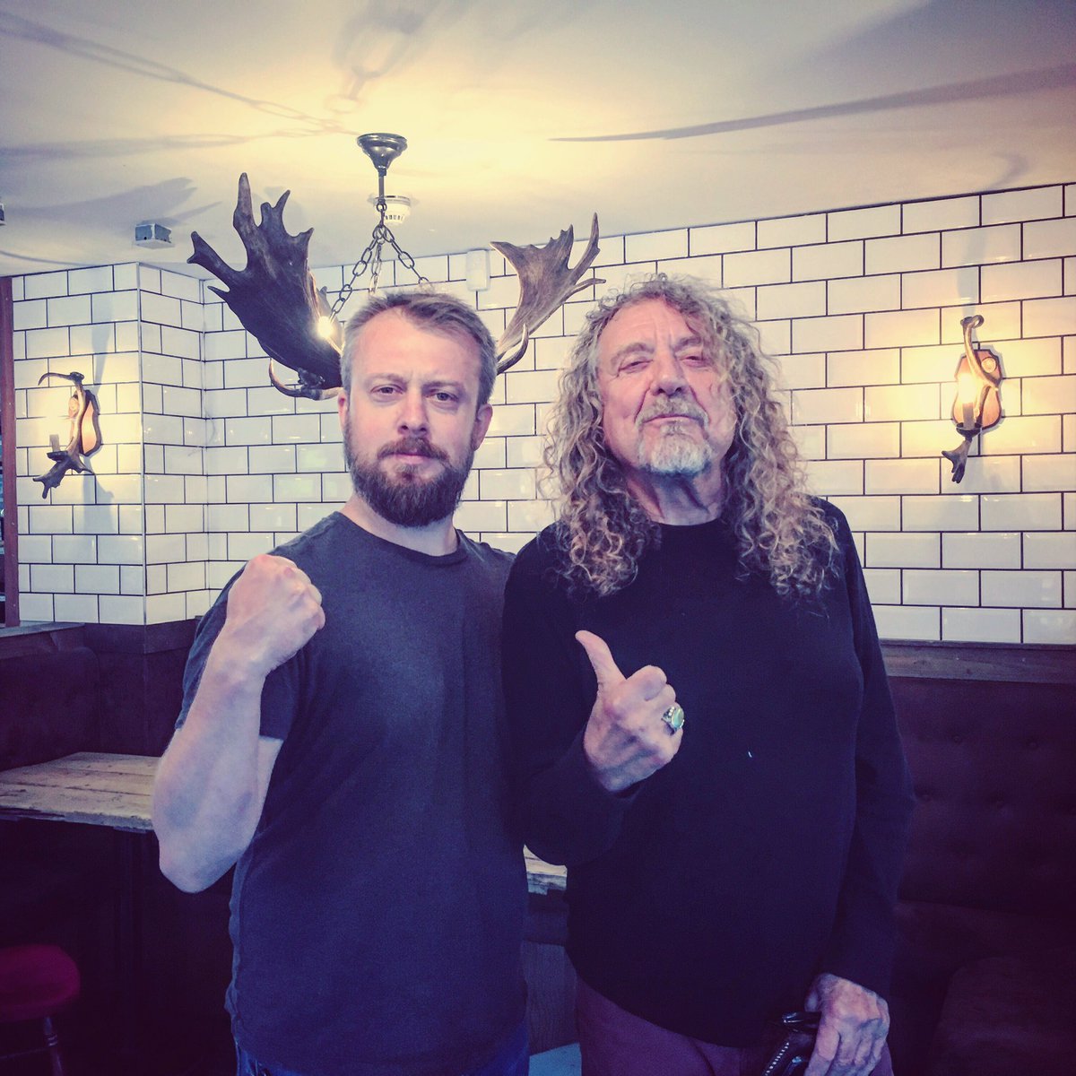 AdamOrzechowsky's tweet photo. When you ask other photographer to take a snap of you with legend Robert Plant and end up with set of antlers:) https://t.co/k1IPlXbF9N