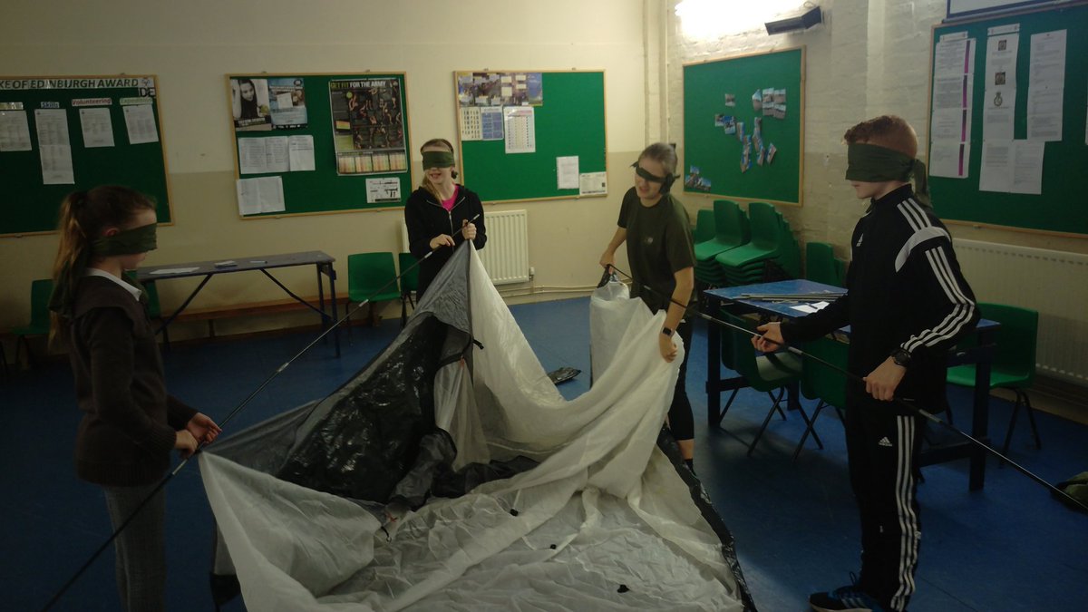 Creative team-building: blindfolded tent construction. Many laughs were had. Well done to all!