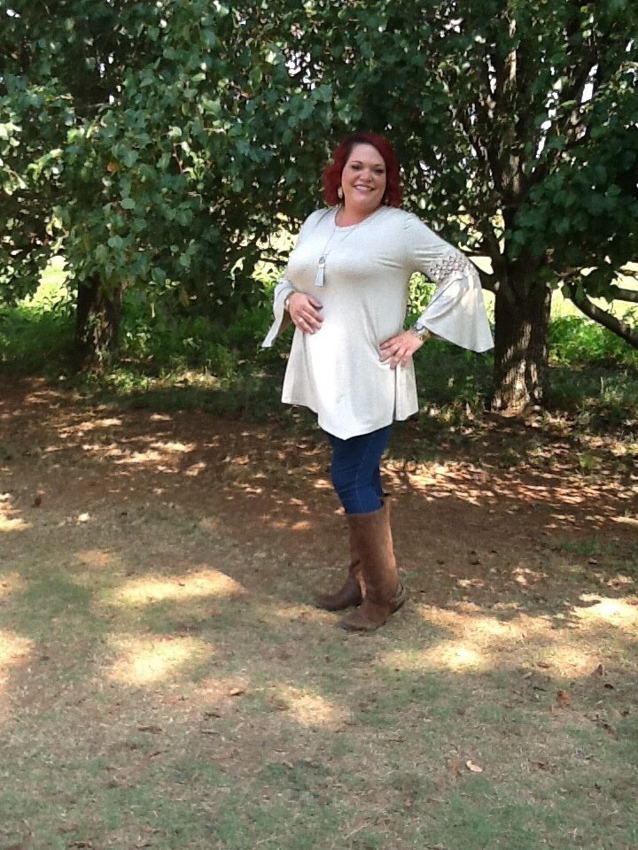 The lace inlets on our "Isabella" tunic will have people doing a double take!  Ready to ship krumscloset.com