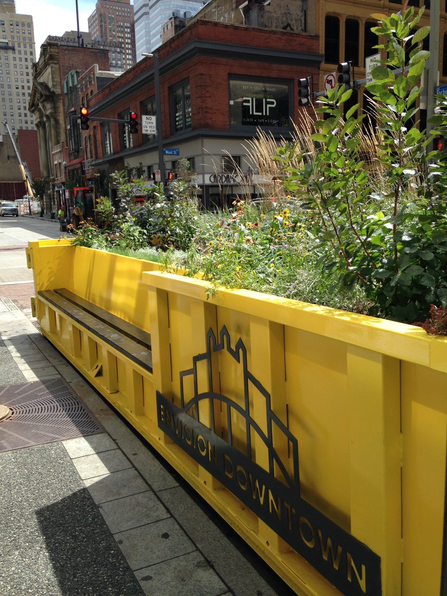 Happy #parkingdaypgh! Found <a href="/envisiondwntwn/">Envision Downtown</a>'s lovely mobile #parklet at corner of Wood/Forbes!🌼