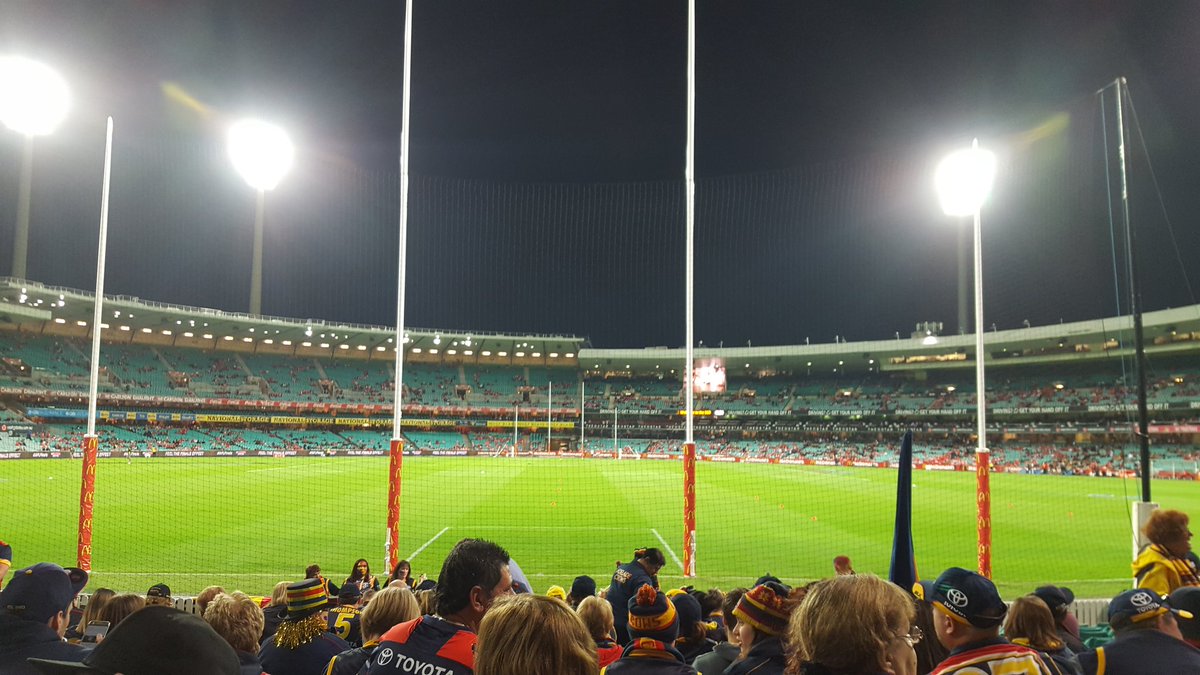 JennaSWoods's tweet photo. Sitting with the Crows cheer squad wearing @PAFC gear. This is new. #comeonSA #weareportadelaide #weflyasone https://t.co/Ehv4h9YjqH