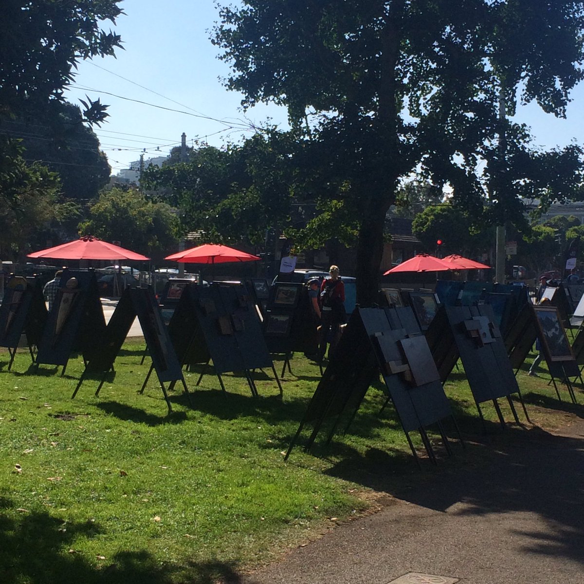ArtSceneSF's tweet photo. Red Umbrella art sale at Stanyan and Haight right now https://t.co/pm2TIDSuGy