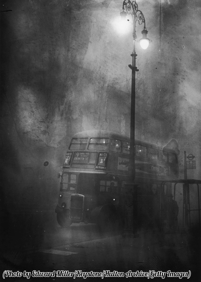 A London bus makes its way along Fleet Street in heavy smog, 1952.