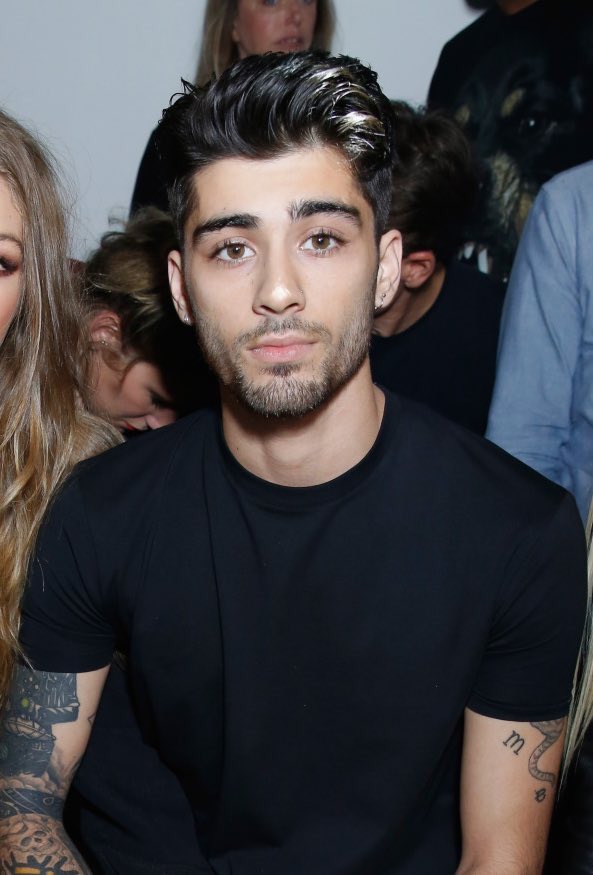 Radio1Direction's tweet photo. Zayn &amp; Gigi at the Versace Fashion Show in London! https://t.co/s98y9LbR7s