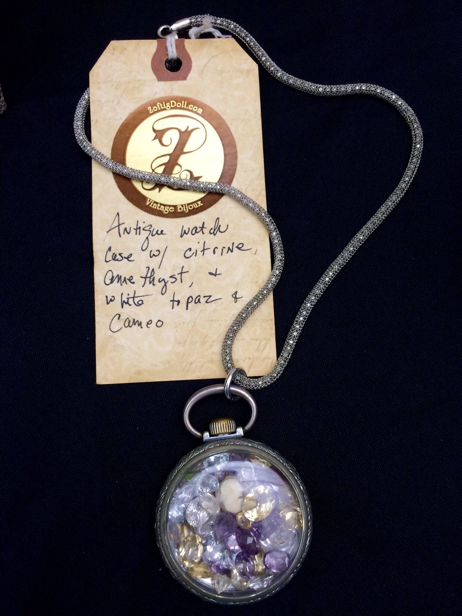 MemphoNewsLady's tweet photo. Charm on this Jan Shively necklace is an original Memphis trolley token! Avail at #ArtPaired #RacquetClub til 5P. https://t.co/JhOrFWRFtL