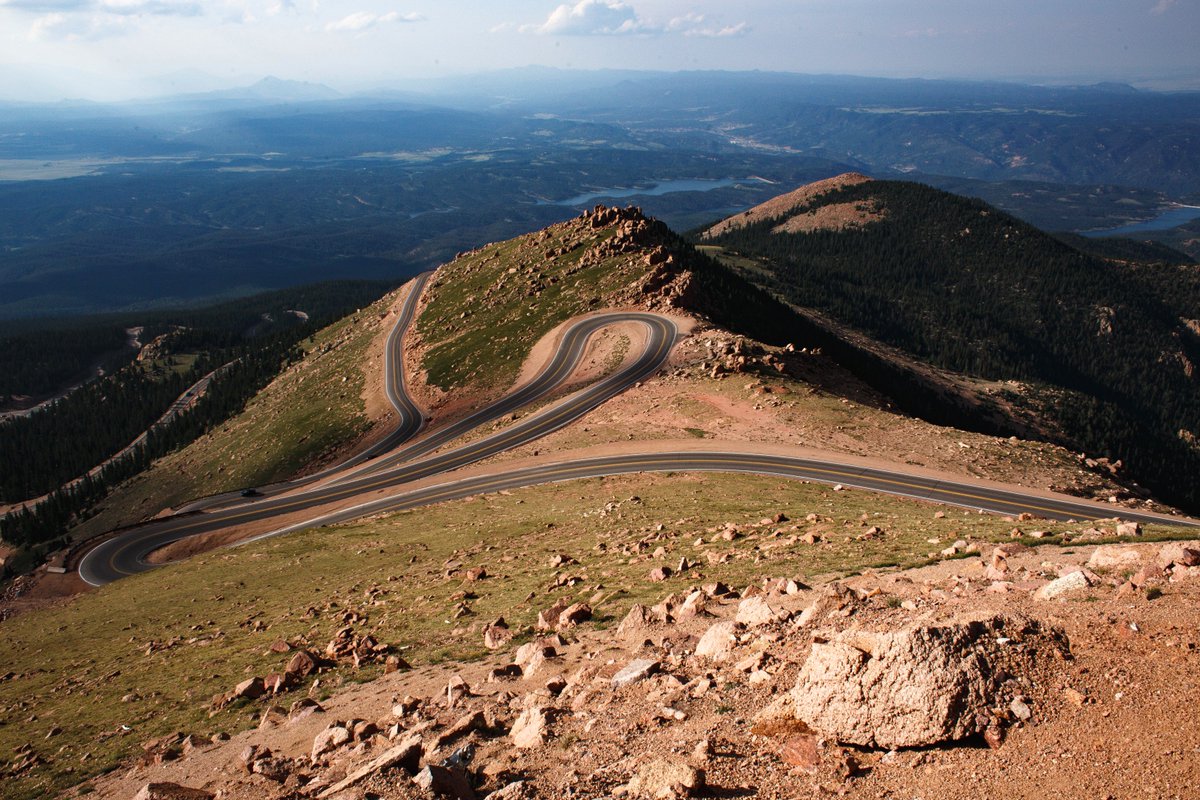gospoty's tweet photo. Who can tell where this is? Outdoorsy with the car on top of picturesque mountains - #unbelievable #fun #hikingtoo https://t.co/6400U1H8ii