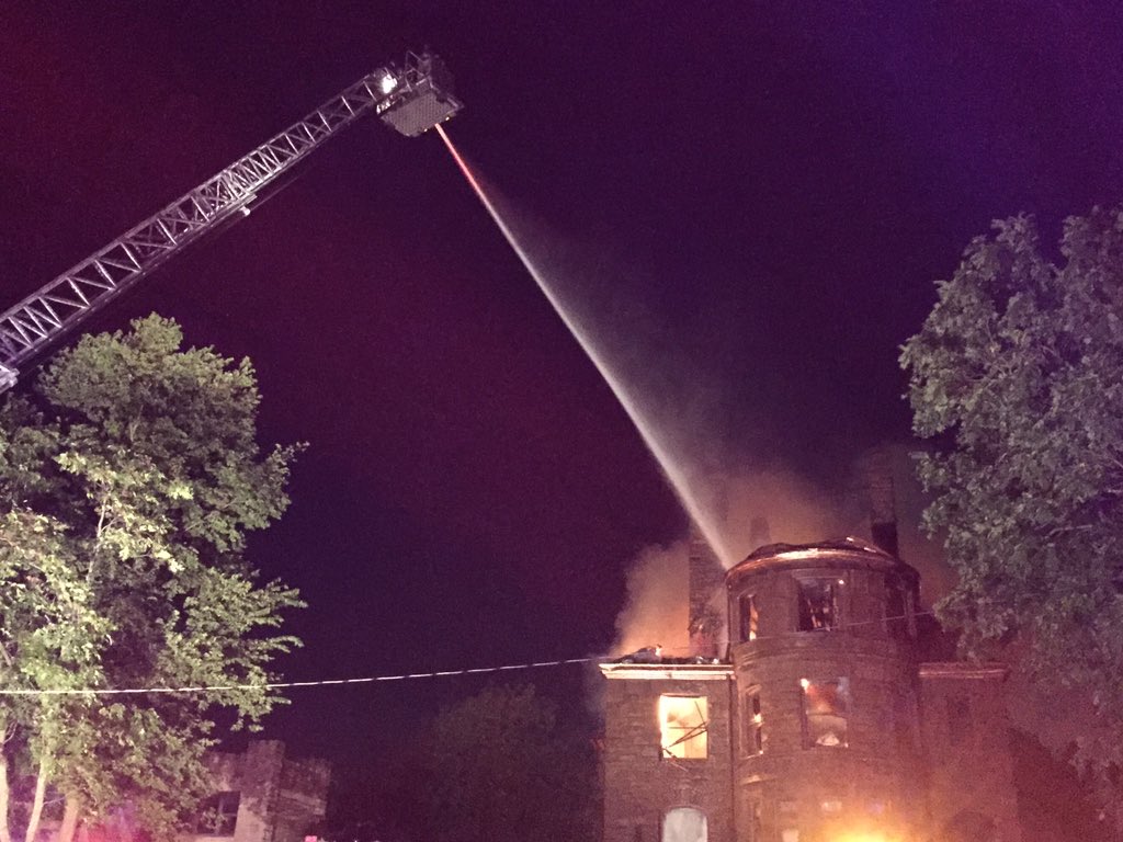 THellhake's tweet image. .@KCMOFireDept fighting house fire from above, just north of #KCMuseum