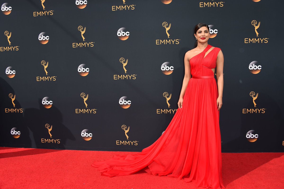 BazaarBrideIn's tweet photo. Dazzling in a customised red @JasonWu @priyankachopra was a sight on #Emmys2016 red carpet https://t.co/w8lC8o47us