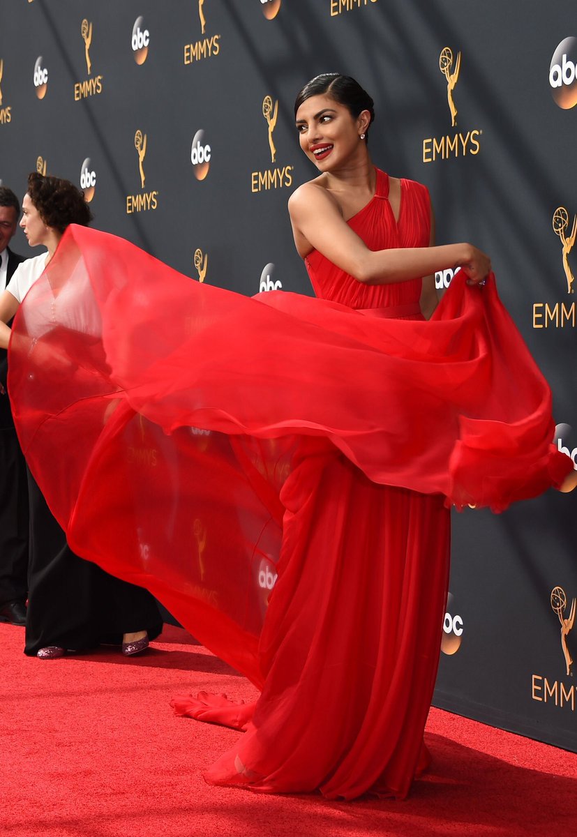 BazaarBrideIn's tweet photo. Dazzling in a customised red @JasonWu @priyankachopra was a sight on #Emmys2016 red carpet https://t.co/w8lC8o47us