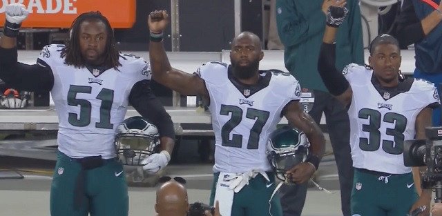BuzzFlavor's tweet photo. Malcolm Jenkins And Two Other Eagles Players Raised Their Fists During National... - https://t.co/0CE3l1QlnI https://t.co/Ijywlc65LX