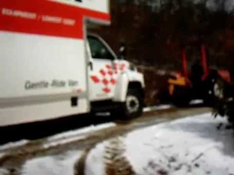 FRESHAvl's tweet photo. #NC Joe Vogler towing Uhaul moving truck up drive with #tractor #SNOW #WNC #AVL 
https://t.co/qJ5z0e24id https://t.co/wsSJiRxmkP